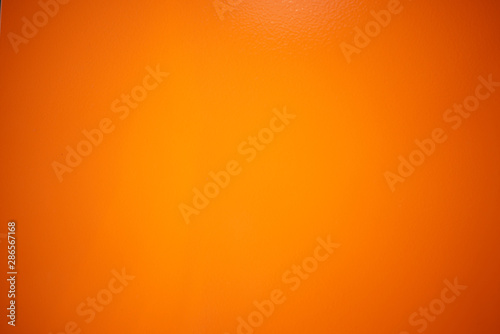 orange stucco wall background, orange painted cement wall texture background