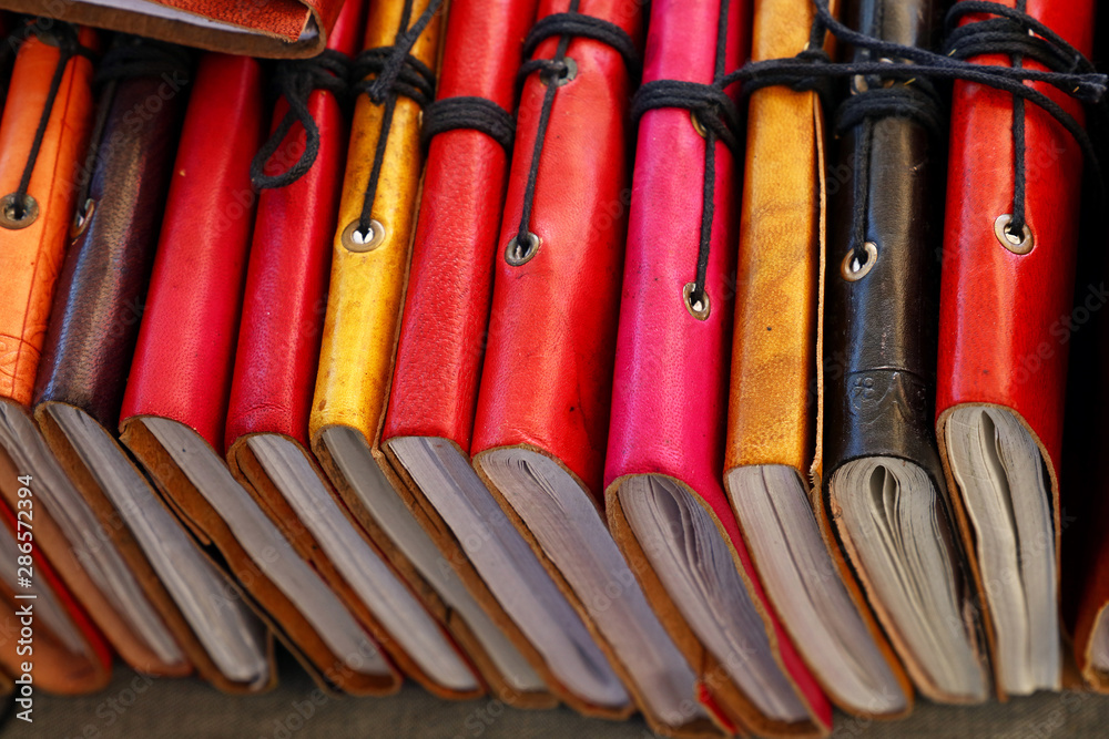 Colorful leather cover notebooks on retail display