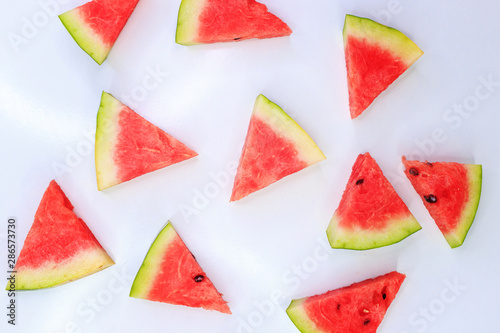 Ripe watermelon on a white background, background and texture.