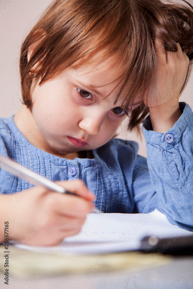Stress for professional burnout concept. Humorous portrait of tired and depressed business child girl working in office. Stress for professional burnout concept. Humorous portrait of tired and depressed business child girl working in office.