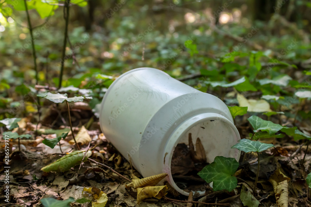 Plastic Can Thrown Away in Forest, Problem in The Natural Environment, Copy Space Plastic Can Thrown Away in Forest, Problem in The Natural Environment, Copy Space