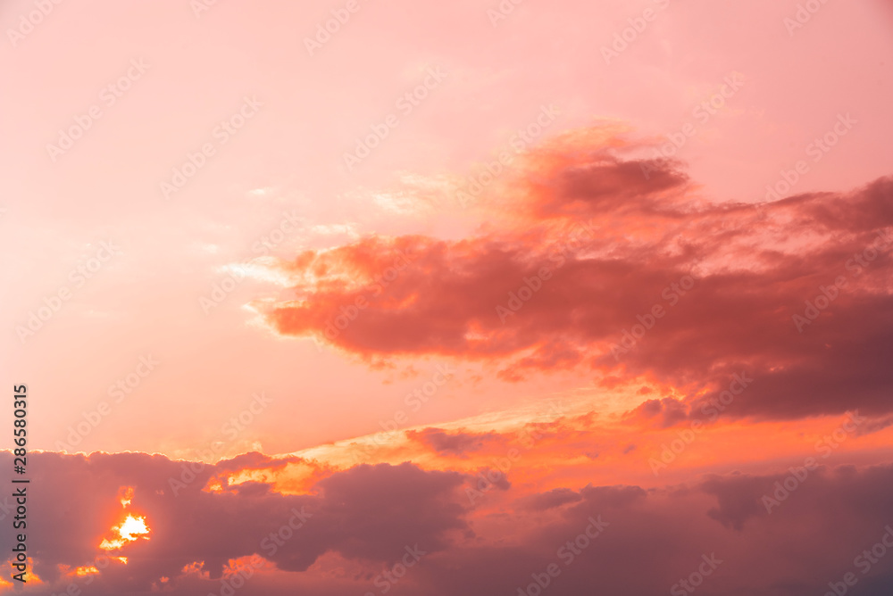 Beautiful golden  sunset sky with colorful clouds.