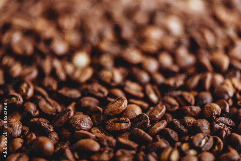 Coffee grains. Background of roasted coffee beans brown. layout. Flat lay. Coffee grains. Background of roasted coffee beans brown. layout. Flat lay.