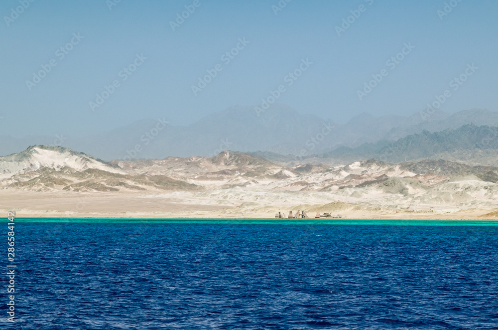 Mountain landscape with blue water in the national park Ras Mohammed, Egypt.