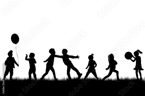 Children silhouettes in nature.