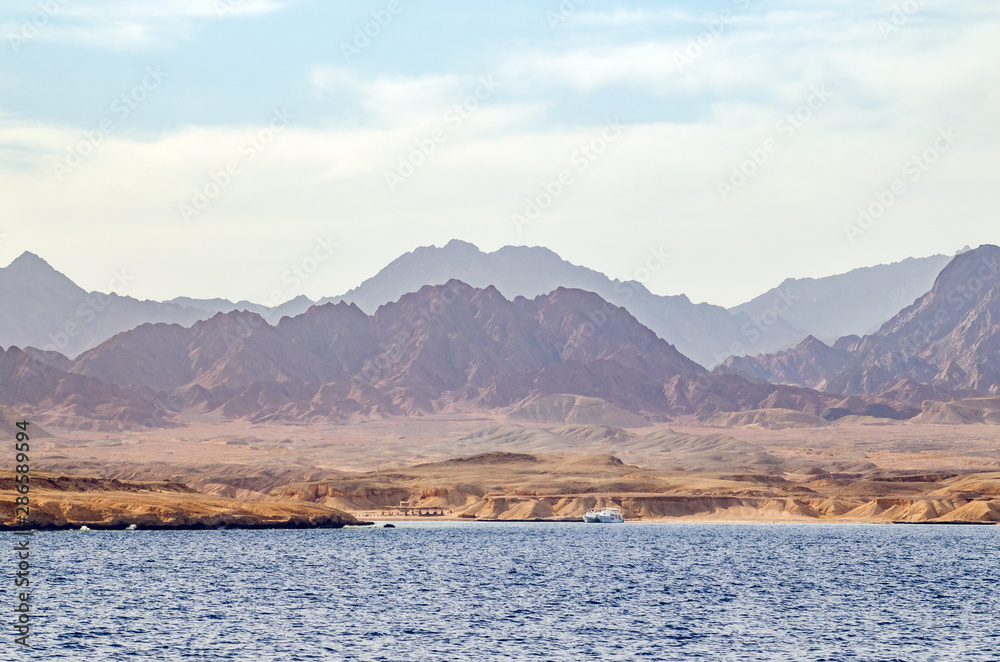 Mountain landscape with blue water in the national park Ras Mohammed, Egypt.