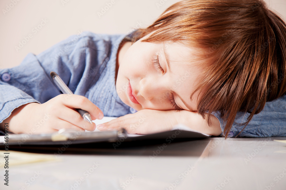I hate my office work. Stress for professional burnout. Humorous portrait of tired business child girl working overtime in office. I hate my office work. Stress for professional burnout. Humorous portrait of tired business child girl working overtime in office.