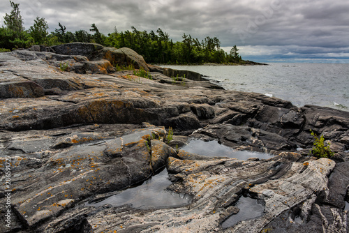 Принти на полотні Multibanded gneiss rocks on the shoreline of an island among the 30,000-island archipelago of the Georgian Bay, in Ontario, Canada