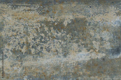 Old gray wall with yellow and brown spots as an abstract background © Тарас Квакуш