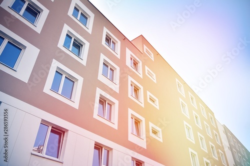 Wallpaper Mural Modern apartment building detail, glass surface with sunlight Torontodigital.ca