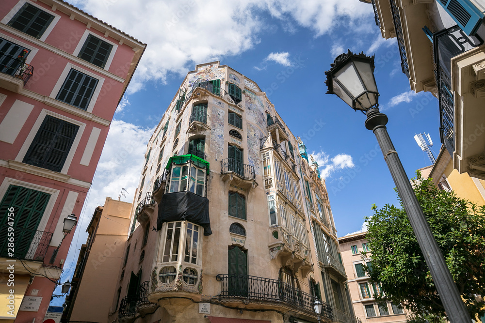 View of beautiful catalonian street in Palma de Mallorca, Spain