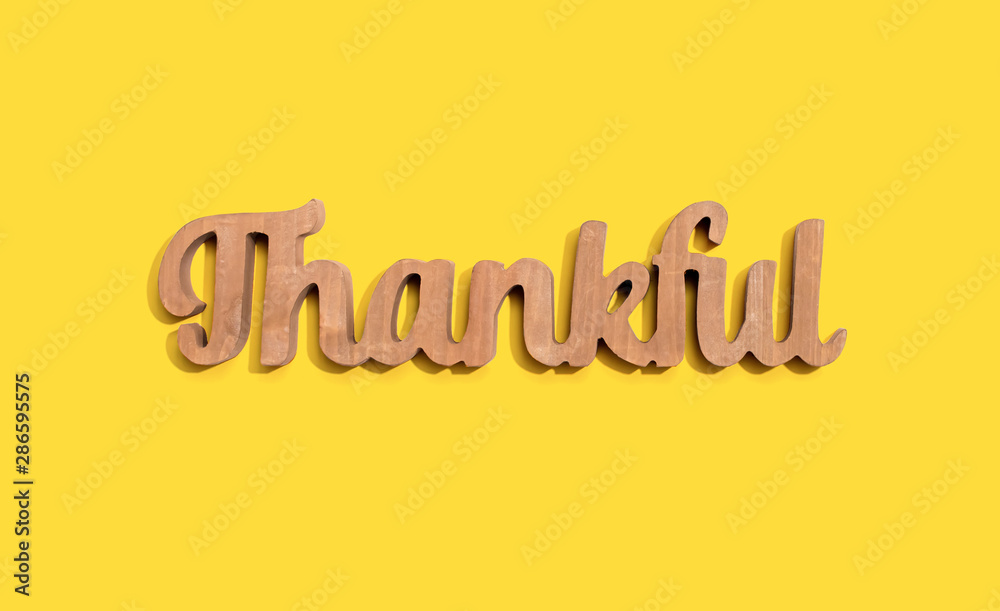 Thankful wooden text from above - overhead view