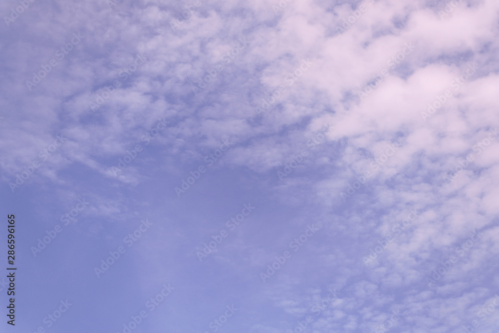 purple sky with airy white clouds. Copy space purple sky with airy white clouds. Copy space