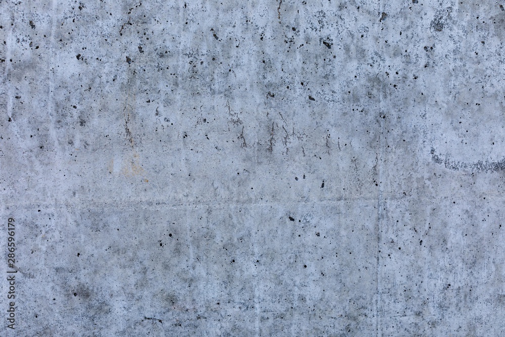 Fototapeta premium Concrete wall with stains and cracks