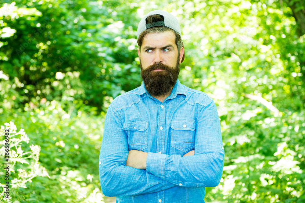 Look your best. hispter style. Fashion portrait of man. Hair beard care. guy in forest. summer camping. serious bearded man. Mature hipster with beard. male facial care. brutal man with beard. barber Look your best. hispter style. Fashion portrait of man. Hair beard care. guy in forest. summer camping. serious bearded man. Mature hipster with beard. male facial care. brutal man with beard. barber