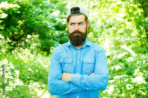 Look your best. hispter style. Fashion portrait of man. Hair beard care. guy in forest. summer camping. serious bearded man. Mature hipster with beard. male facial care. brutal man with beard. barber