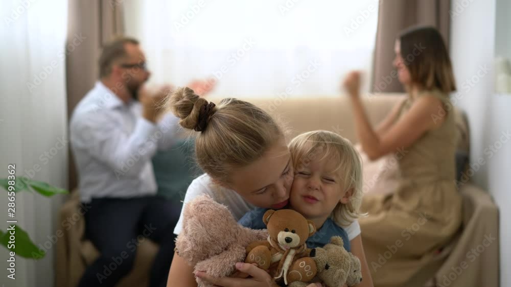 Married couple Sofa Gesture of aggression Quarrel Children suffering from violence brother and sister teddy bear Violence Relationships Divorce Disagreements Concept Reconciliation Love Step towards Married couple Sofa Gesture of aggression Quarrel Children suffering from violence brother and sister teddy bear Violence Relationships Divorce Disagreements Concept Reconciliation Love Step towards