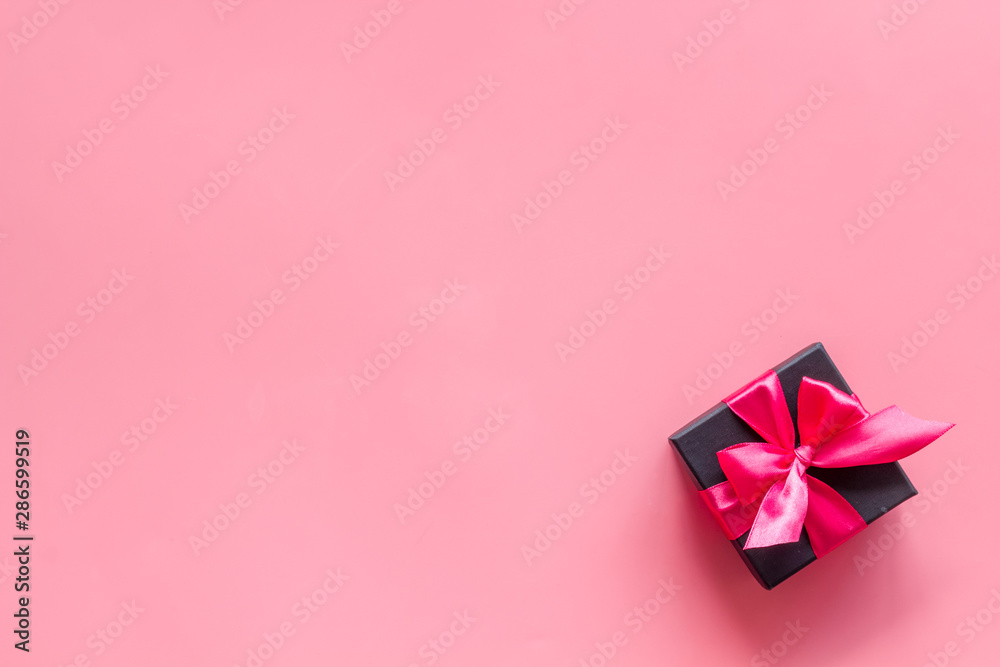 box with present for holiday on pink background top view mockup