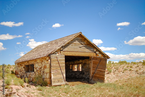 USA, Nevada, Nye County, Monitor Valley, Potts Ranch. An amandoned stone garage style stable building at this old homestead site. © Dominic Gentilcore