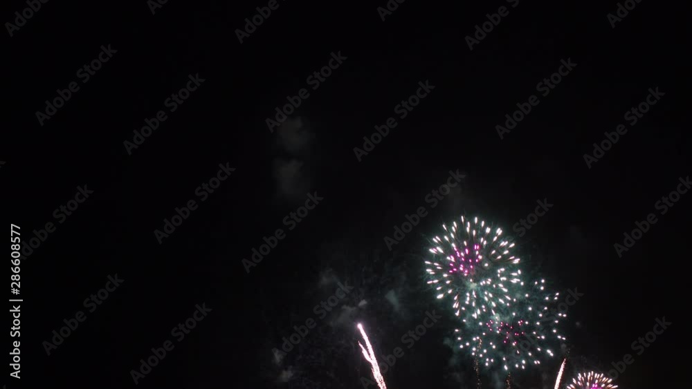 An fixed shot of a night sky full of fireworks. An fixed shot of a night sky full of fireworks.
