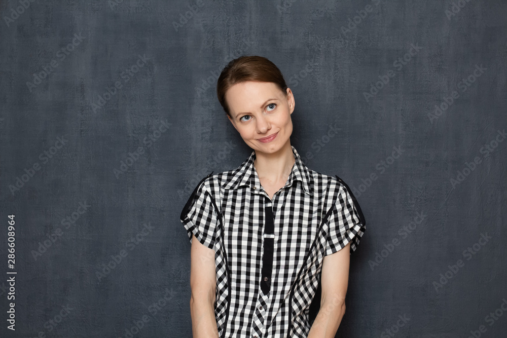 Portrait of happy girl thinking about something pleasant Portrait of happy girl thinking about something pleasant