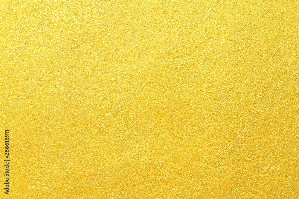 Golden textured wall for background and luxurious graphic design purpose Golden textured wall for background and luxurious graphic design purpose