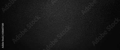 abstract black background texture with light glitter dart texture