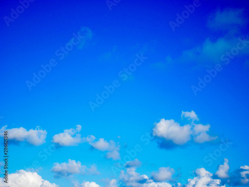 Blue sky and white clouds,beautiful sky background © Warawut