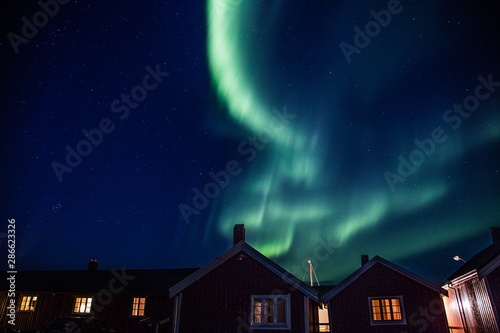 Northern lights above Reine in Lofoten islands in Norway