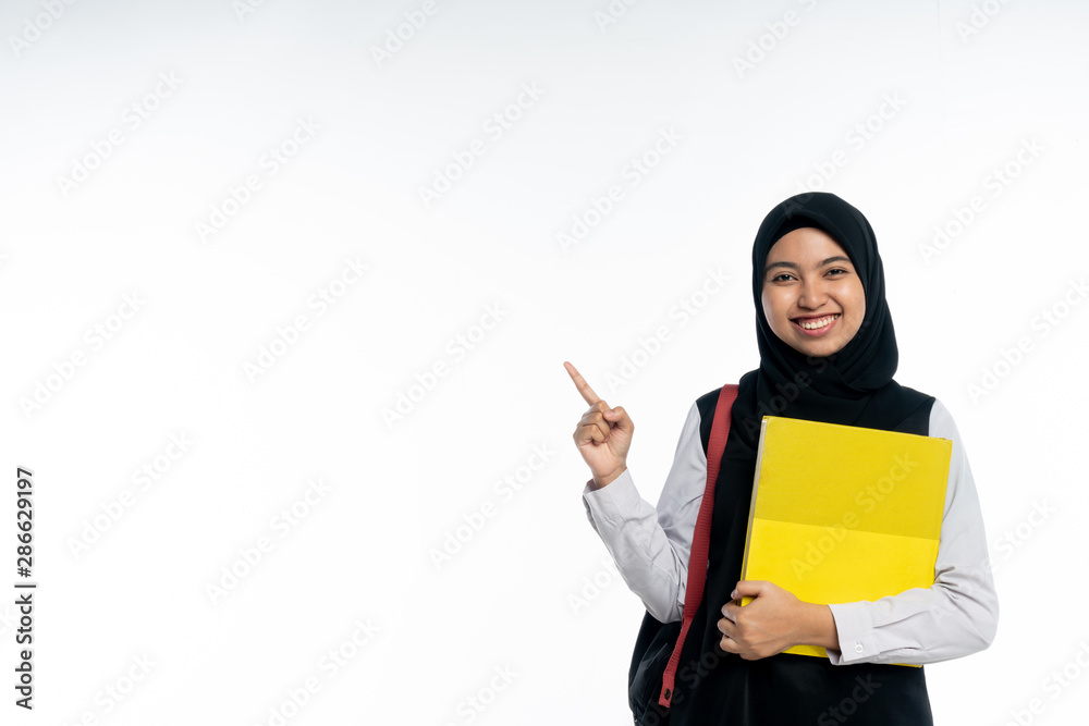 smiling young asian stylish student is standing on white background smiling young asian stylish student is standing on white background