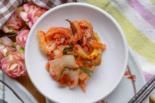 Kimchi serving on white plate