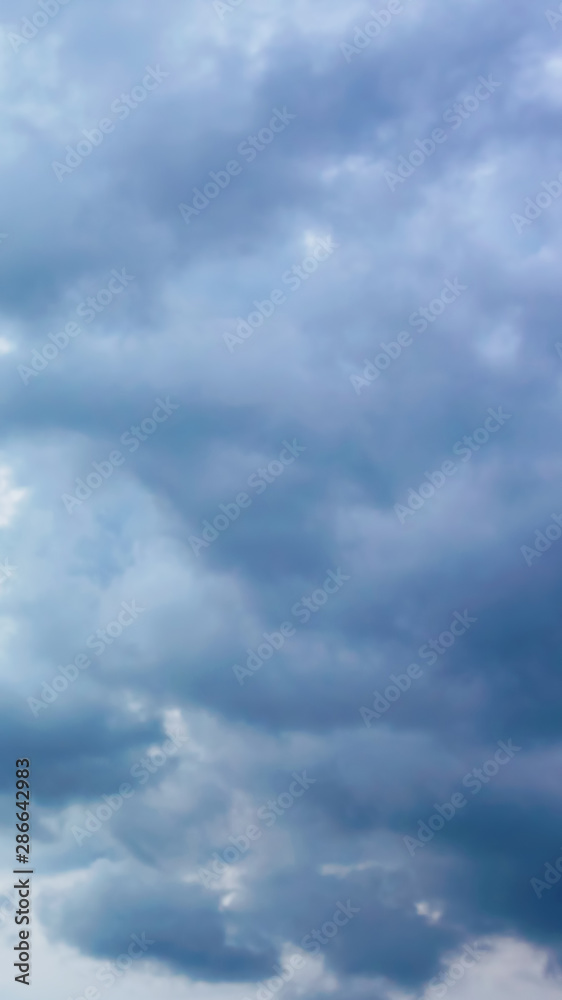 Vertical photograph of dark blue clouds before a thunderstorm Vertical photograph of dark blue clouds before a thunderstorm