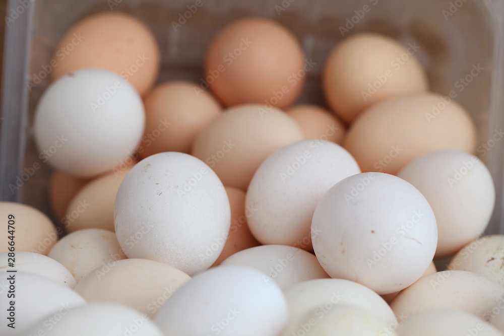 Fresh farm chicken eggs on the counter.