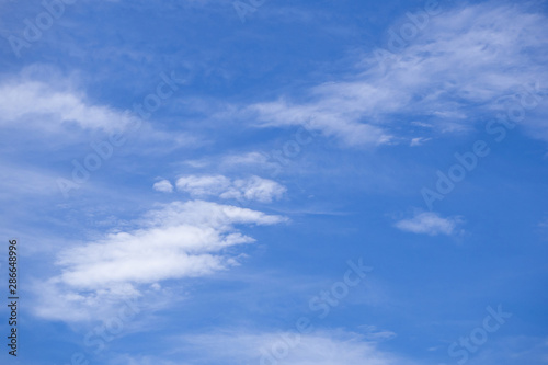 Bright blue sky there is white clouds the sky