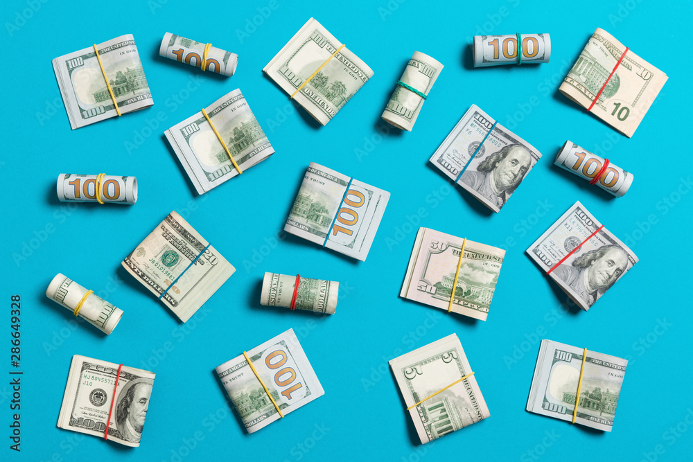 colored Background with money american hundred dollar bills on top wiev with copy space for your text in business concept