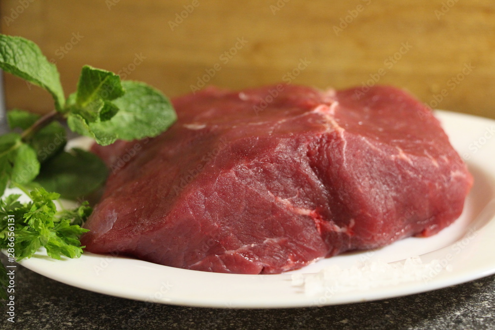 raw meat on a plate