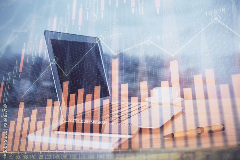 Stock market graph and table with computer background. Multi exposure. Concept of financial analysis. Stock market graph and table with computer background. Multi exposure. Concept of financial analysis.