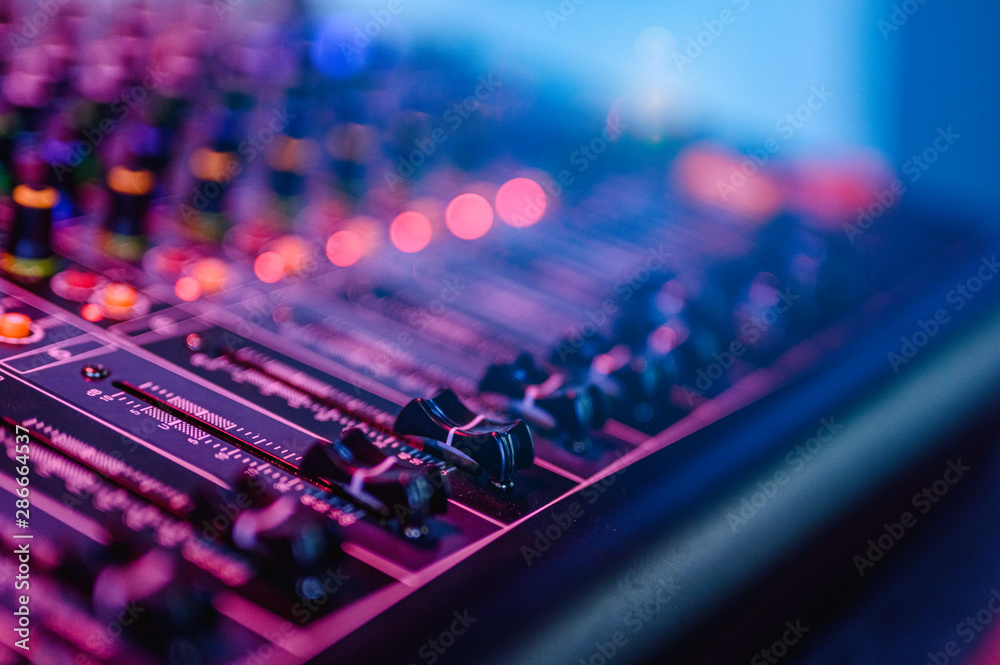 Professional audio mixing console in concert. - obrazy, fototapety, plakaty 