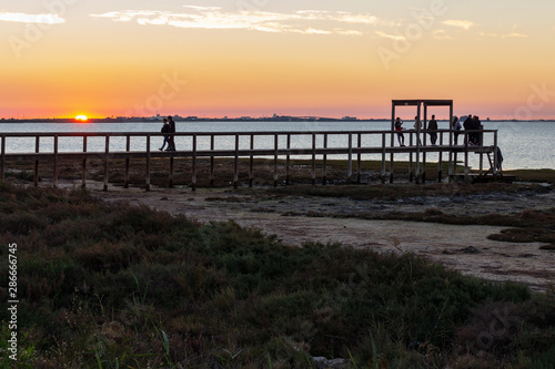 Wooden jetty at dusk in the bay of San Fernando