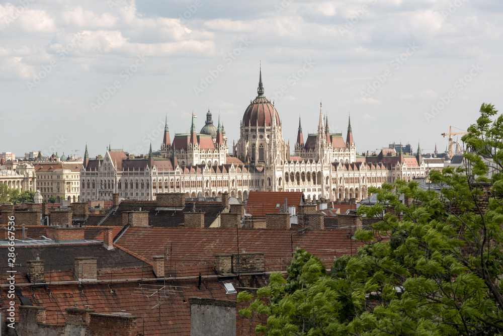 Hungarian Parliament in Budapest, view over the city roofs