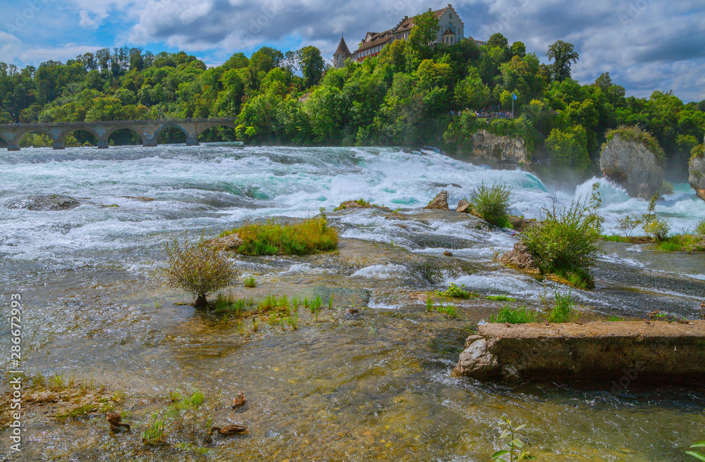 At the Rhine Falls in Switzerland. - There are much bigger waterfalls, but this At the Rhine Falls in Switzerland. - There are much bigger waterfalls, but this