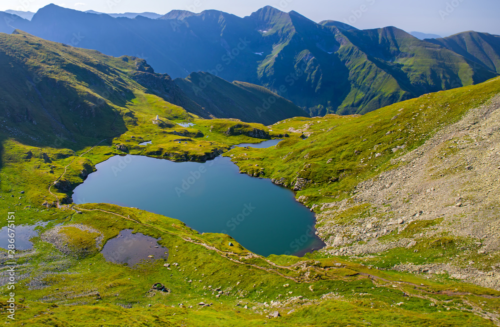 Mountain summer lake in alpine area