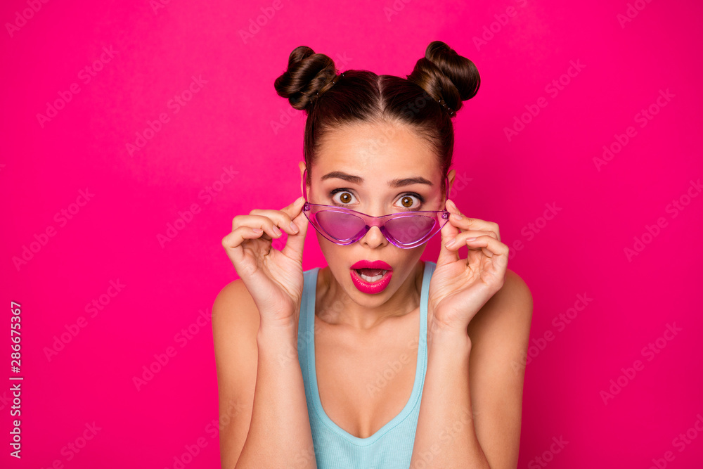 Closeup photo of pretty lady eyes full of fear wear sun specs blue tank-top isolated pink background