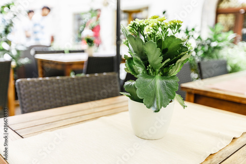 Selective focus of table of coffee shop outside view in Autria