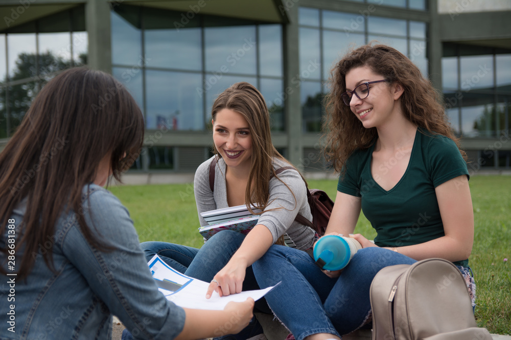 Female college students on university campus Female college students on university campus