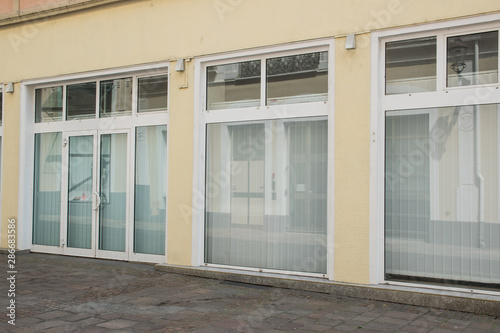 Wallpaper Mural Old empty door and windows in the city. Torontodigital.ca