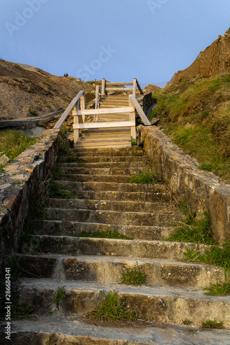 wooden and stone stairs on Barrika beach in Biscay