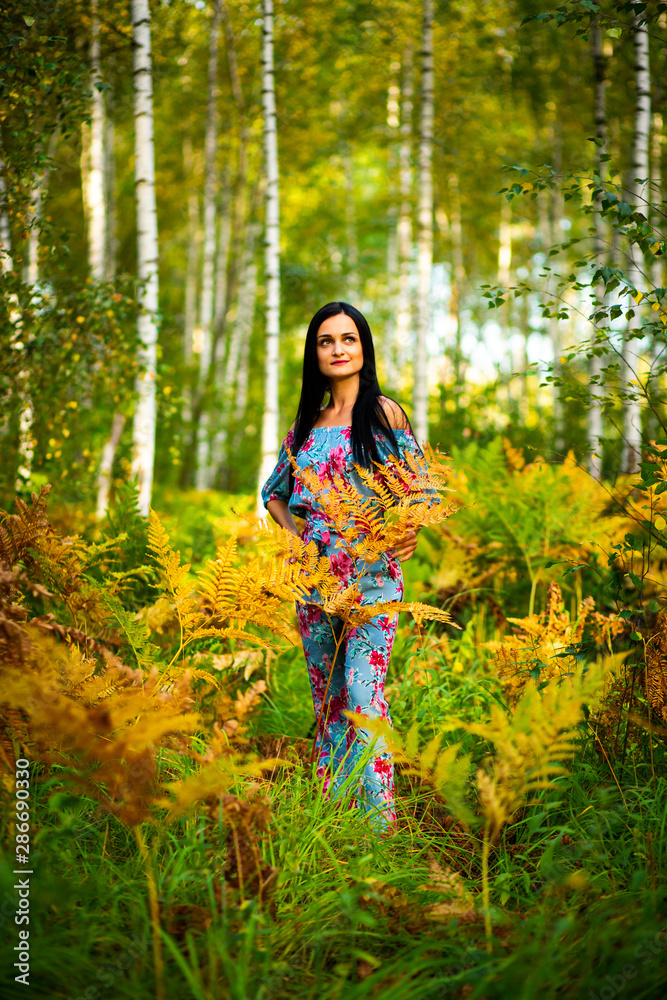 young beautyful girl in summer forest young beautyful girl in summer forest