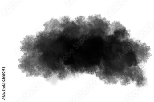 abstract powder splatted background. Black powder explosion on white background. Colored cloud. Colorful dust explode. Paint Holi.