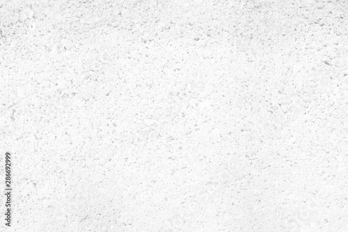 White Concrete Wall Texture Background. © mesamong